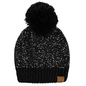 Black C.C Sequin Cuff Pom Pom Beanie Hat, Stay warm and stylish even during the coldest days with this. This hat is made with durable materials for long-lasting comfort and features a cozy and fashionable pom pom on the top. The added sequin cuff adds a glamorous touch to the classic beanie style. Perfect winter gift idea.