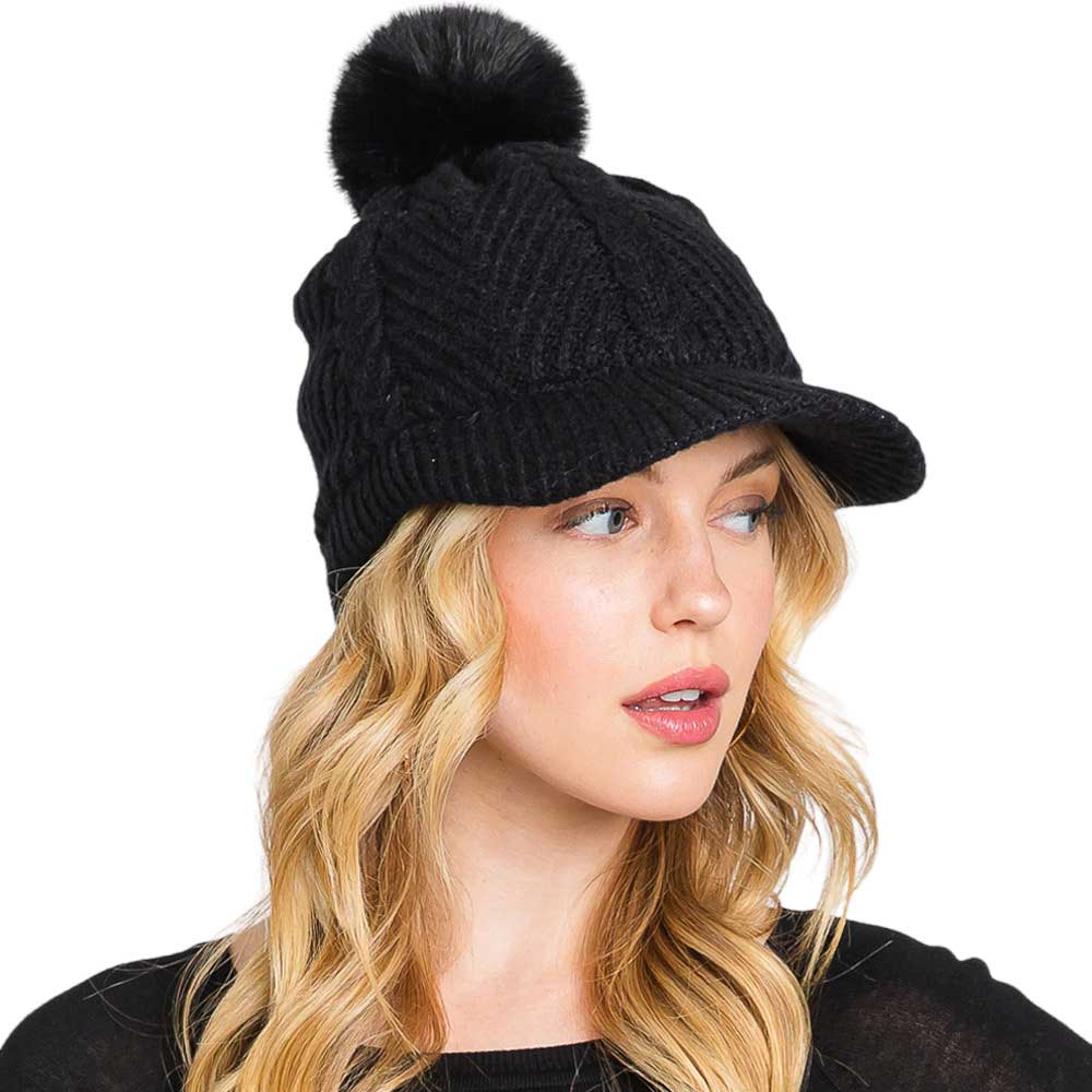 Black Chevron Patterned Faux Fur Pom Pom Knit Cap will keep you warm and stylish in winter weather. Its faux fur pom pom and chevron patterned knit detail makes this cap the perfect mix of luxury and comfort. Wear it confidently and stay warm on cold days. Excellent gift choice for family members and friends on chilly days.