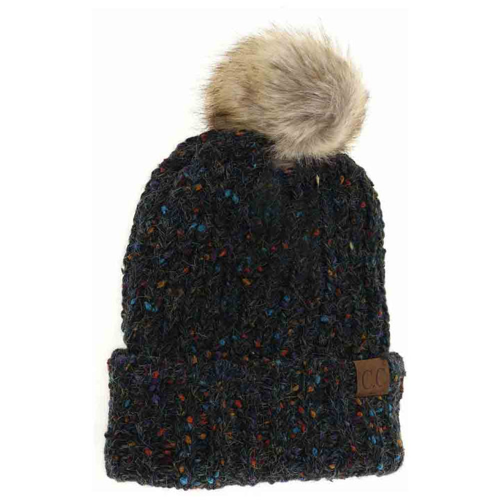 Black Confetti Mohair Ribbed Fur Pom C.C Beanie combines cozy warmth with stylish texture. Crafted with a soft mohair blend, its ribbed design offers a comfortable, snug fit that retains heat. Topped with a luxurious fur pom, this beanie adds a sophisticated touch to any cold-weather outfit while ensuring superior comfort and durability. Ideal for both casual and refined winter wear.