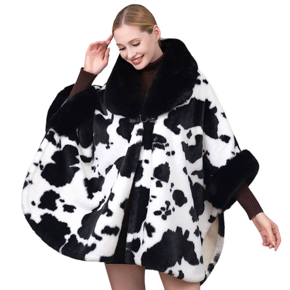 Black Cow Patterned Faux Fur Collar Poncho, is a perfect way to add an extra layer of warmth and style to your winter wardrobe. With its cozy faux fur collar and bold pattern, it is sure to make a statement. Ideal gift for fashion loving friends and family members, special ones, colleagues or Secret Santa gift exchange.