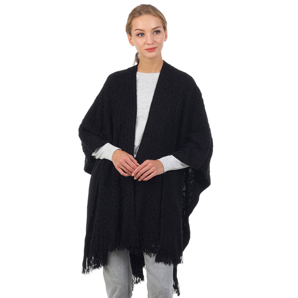 Ivory Cut Out Detailed Fringe Poncho, with the latest trend in ladies' outfit cover-up! The high-quality knit poncho is soft, comfortable, and warm but lightweight. It's perfect for your daily, casual, party, evening, vacation, and other special events outfits. A fantastic gift for your friends or family.
