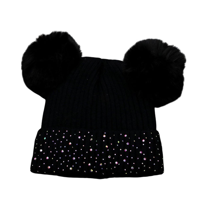 Black Double Pom Pom Bling Studded Cuff Beanie Hat, stay warm and stylish with our beanie hat. This hat features two pom poms, studded accents, and a cozy cuff.