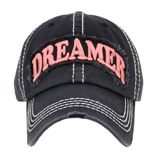 Black Dreamer Message Vintage Baseball Cap, is crafted from durable cotton twill. It features an adjustable strap with an antique brass buckle for a snug fit and a unique vintage look. The bold printed message displays the wearer's commitment to their dream. Get the perfect fit and stylish look with this one-of-a-kind cap.