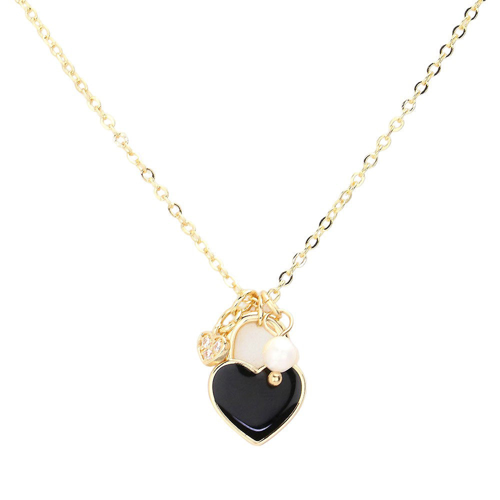 Black Enamel Heart Pearl Pendant Necklace, is a stunning addition to any jewelry collection. With its delicate heart-shaped pendant and lustrous pearl, this necklace adds a touch of elegance to any outfit. Handcrafted with high-quality enamel and a pearl, this necklace is a timeless piece that is sure to impress.