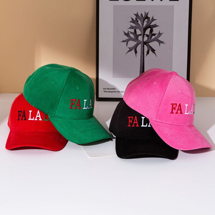 Celebrate the season with this playful holiday cap featuring FA LA LA embroidered in festive colors. A fun Christmas accessory that adds cheer to any outfit, perfect for parties, gatherings, or gifting. Adjustable fit makes it a stylish novelty hat for spreading holiday spirit all season long.
