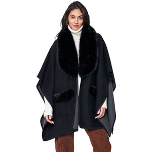 Black Faux Fur Trimmed Front Pockets Ruana Poncho, Elevate your winter style. Crafted with faux fur accents and featuring convenient front pockets, it adds warmth, texture, and a touch of elegance to any outfit. Awesome gift choice for your family members, friends, fashion-loving young adults, colleagues, or yourself.