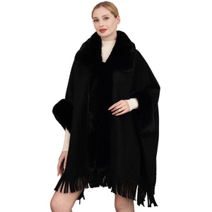 Black Faux Fur Trimmed Solid Fringe Ruana Poncho, features a soft faux fur trim for maximum warmth and comfort. Whether dressing up for a night out or staying at home, this fashionable poncho has you covered during colder days. An ideal winter gift choice for loved ones, fashion-loving friends or family members, or yourself.