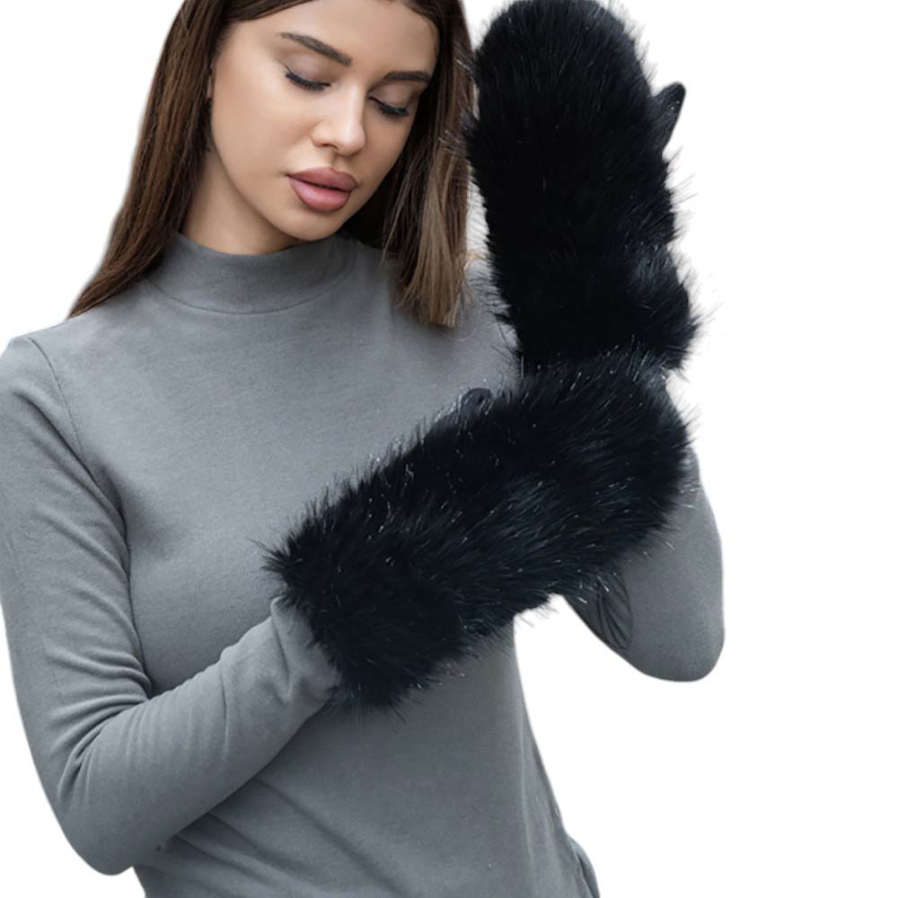 Beige-Faux Fuzzy Fur Mitten Gloves offer the ultimate combination of style and warmth. Made with soft and luxurious faux fur, they provide maximum comfort for your hands while adding a touch of elegance to any outfit. With these gloves, you can stay cozy and fashionable all winter long.