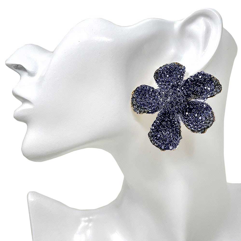Black Felt Back Bling Studded Flower Earrings, These elegant earrings are the perfect accessory to add a touch of sophistication to any outfit. The felt backing adds a unique texture while the studded flower design adds a touch of glam. Handcrafted with precision and attention to detail, these earrings will make a statement.