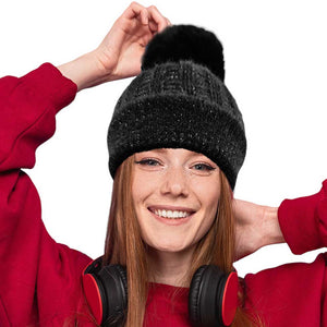 Black Fleece Lining Pom Pom Beanie Hat, is perfect for chilly days. This stylish hat is sure to keep you warm and comfortable during the cold. Whether you're headed out for a walk or just spending time outdoors, this fashionable beanie is a great accessory. A perfect gift choice for your close people in the winter season. 