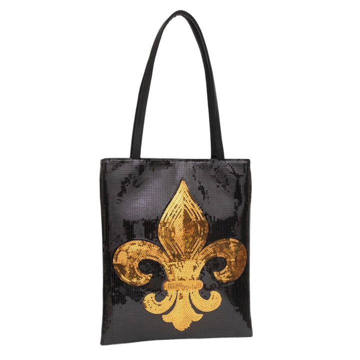 Black-Fleur de Lis Sequin Front Tote Bag is the perfect accessory for adding a touch of elegance and glamour to your outfits. Featuring a beautiful sequin front design, this tote bag is not only stylish but also practical, with plenty of space to carry all your essentials. Elevate your style with this stunning tote bag.