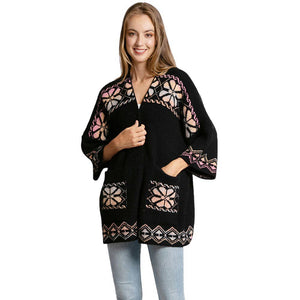 Black Floral Geometric Cardigan Poncho, features a unique floral geometric design that's sure to make you stand out in any crowd. Perfect for winter, it'll keep you warm and add a splash of color to your wardrobe. Lightweight and comfortable, it is the perfect addition to any outfit. Perfect winter gift for your loved ones.