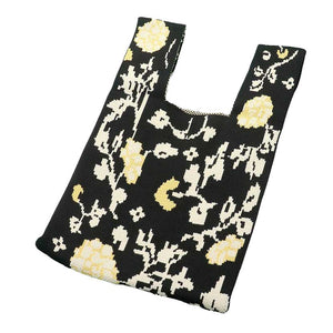 Black Floral Knit Tote Bag, is the perfect accessory for all your shopping needs. It is made from knit fabric and designed with a floral pattern. The bag is lightweight, making it easy to carry and store books, groceries, and more. Its stylish and timeless look makes it a perfect gift, this tote bag will make you noticeable.