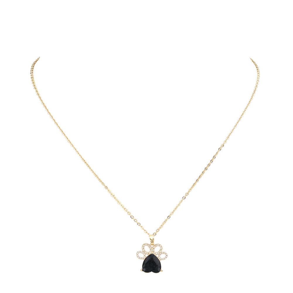 Black, Show your love for animals with this stylish Glittered Heart Pointed Paw Pendant Necklace. Crafted from quality materials, the pendant features a glittered heart and pointed paw, for an eye-catching look. Wear it solo or as part of a layered look for a stunning statement. Ideal gift item for the animal lovers.