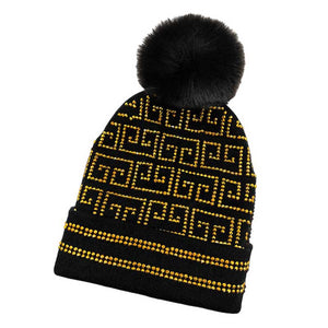 Black Gold Bling Greek Pattern Pom Pom Beanie Hat, this beanie hat is designed with a unique "bling" Greek pattern and is crafted from a soft material for a comfortable fit. The pom pom embellishment adds extra flair for a fashionable and fun look. Perfect winter gift idea for fashion-forwarded loved ones.