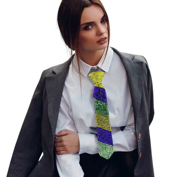 Black-Green-Purple-Yellow-Mardi Gras Bling Neck Tie Necklace is the perfect accessory for any festive occasion. Made with high-quality materials, it adds a touch of elegance and sparkle to any outfit. The unique neck tie design makes it a versatile piece that can be worn as a necklace or a statement choker. Celebrate in style with this must-have accessory. 