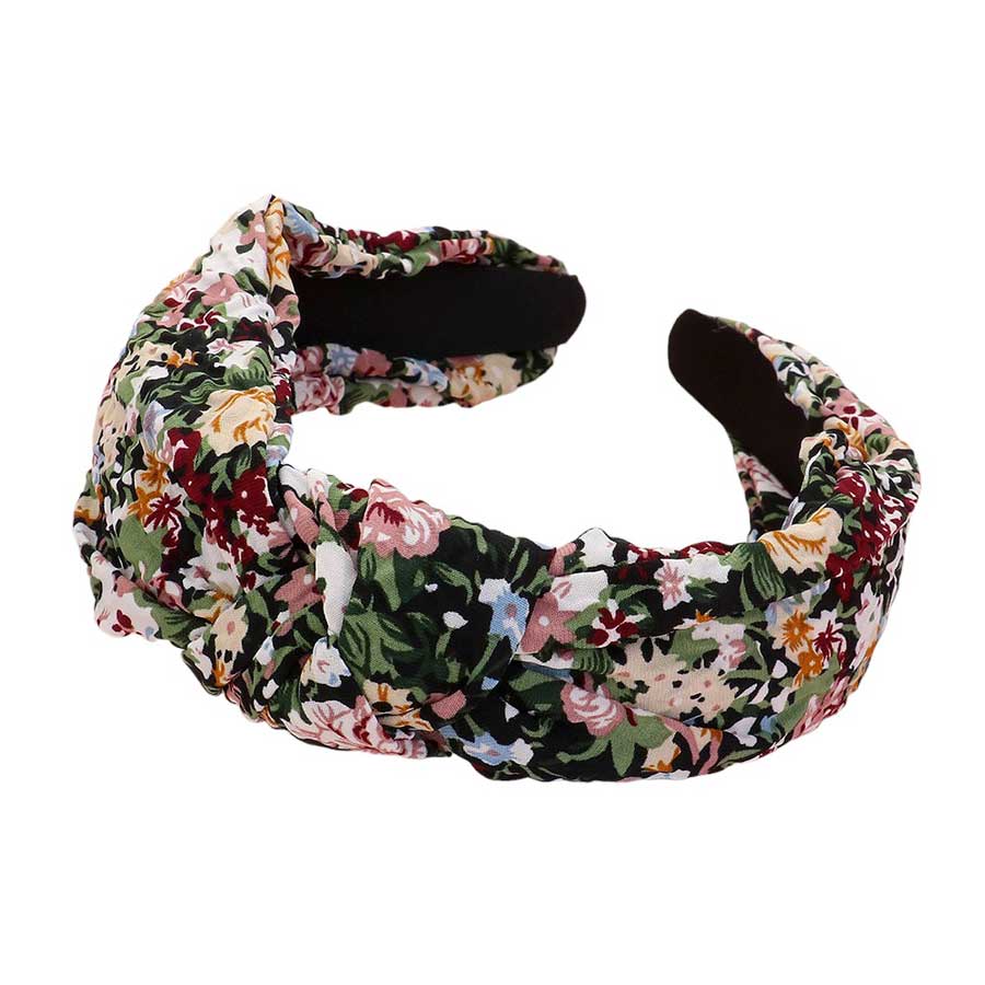 Orange Multi This Wild Flower Pattern Printed Knot Headband adds a stylish touch to any outfit with its intricate floral design. Made with high-quality material, it provides both comfort and durability. Perfect for a casual or formal look, it's the must-have accessory and an ideal gift for any fashion-forward individual.