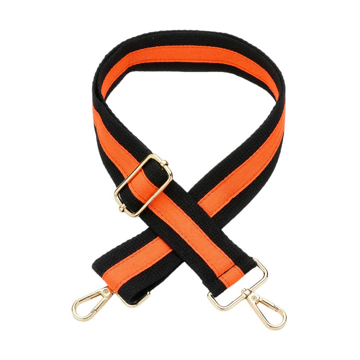 Black Orange Game Day Color Block Bag Strap,  is an excellent addition to your game day look. This bag strap features a dynamic color block pattern in your team's colors, making it a striking and eye-catching accessory. The strap is fully adjustable, allowing you to wear it crossbody or over the shoulder for maximum comfort.