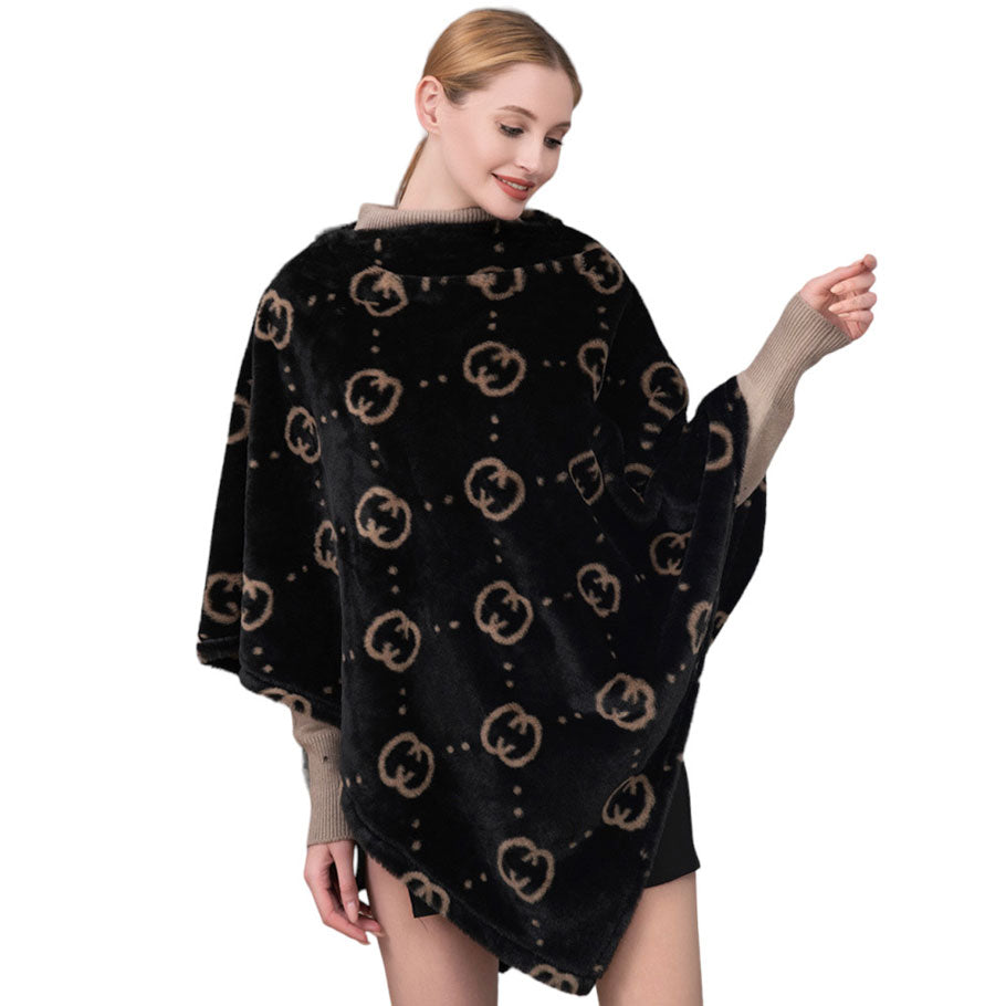 Black Patterned Faux Fur Poncho, with the latest trend in ladies' outfit cover-up! The high-quality faux fur poncho is soft, comfortable, and warm but lightweight. Its beautiful color goes with every outfit and surely makes you stand out from the crowd. A fantastic gift for your friends or family. Happy Winter!