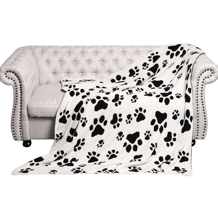 Black Paw Patterned Reversible Throw Blanket, Make a cozy addition to your home. This stylish and comfortable throw blanket is made with a high-quality blend of materials to ensure long-lasting softness and comfort. Ideal gift for newly married couples, new families, or your own family. 