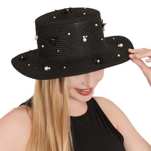 Black Pearl Flower Embellished Straw Sun Hat, is a must-have for any fashion-forward individual! The beautifully crafted pearl flower detailing adds a touch of elegance to the classic straw sun hat. Protect your skin from the sun's harmful rays while looking stylish and chic. Perfect for any outdoor occasion! 