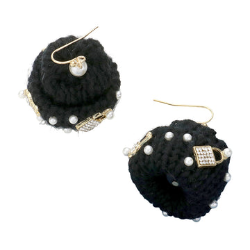 Black Pearl Key Lock Embellished Knit Beanie Hat Dangle Earrings add a touch of sophistication to any outfit. The pearl and key lock embellishments provide a unique and trendy twist, perfect for any fashion-forward individual. Stay warm and stylish with these versatile earrings.