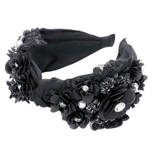 Black This stylish Pearl Stone Embellished Flower Cluster Knot Burnout Headband offers timeless beauty with its flower and leaf theme, knot design, and pearl stone embellishments is a perfect fit for any occasion. This headband is sure to fit anyone comfortably. Create a timeless look with this headband.
