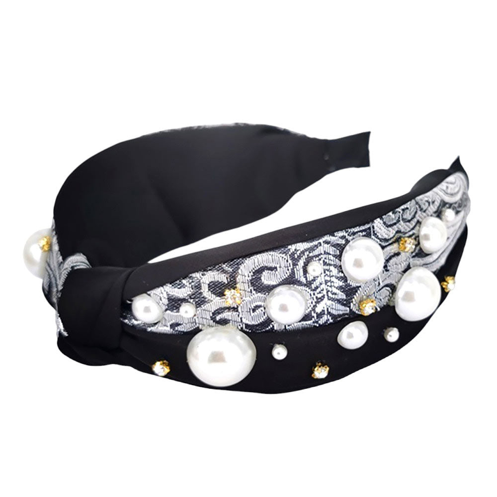 Black This elegant Pearl Stone Embellished Knot Burnout Headband is the perfect accessory to add to your look. Featuring a beautiful pearl stone embellishment, this headband will help you stand out in the crowd. With an intricate knot design, you're sure to get compliments when you wear it. Ideal for every occasion.