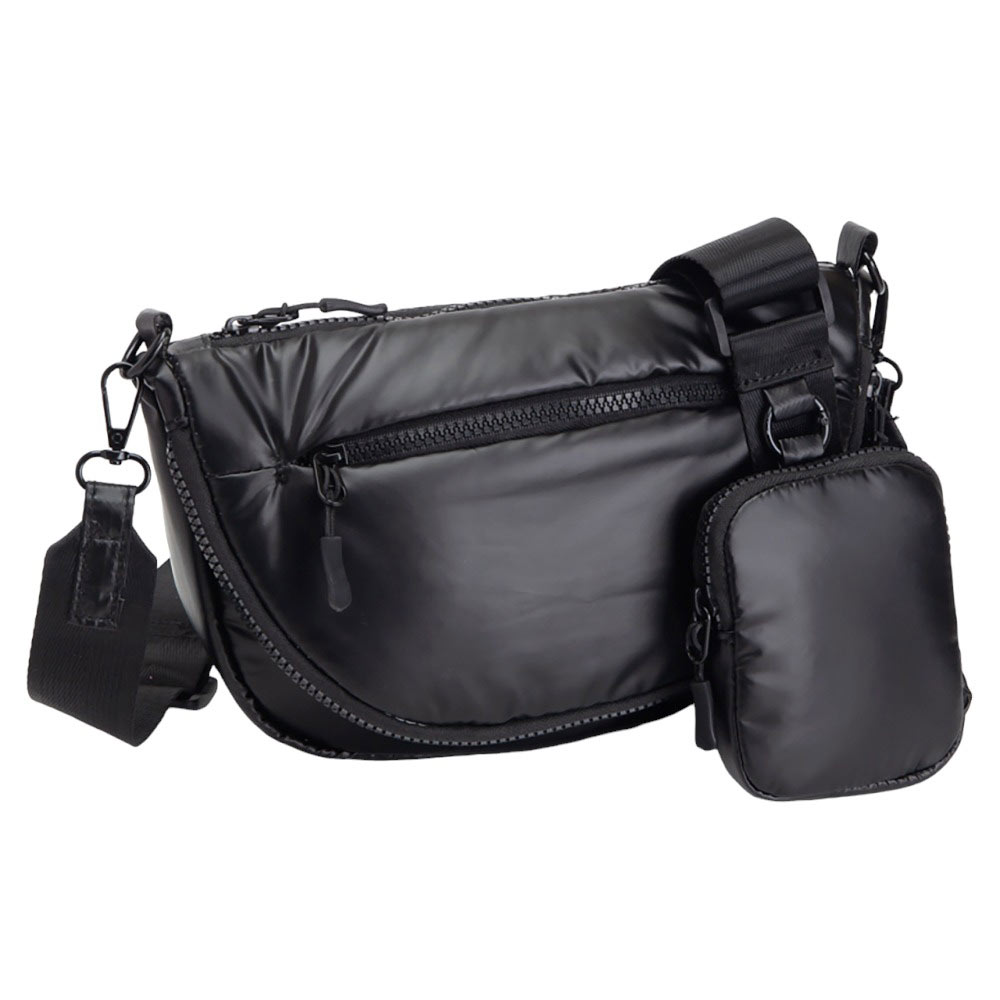 Black Puffer Half Moon Crossbody Bag, the lightweight, stylish design features a durable water-resistant nylon that is perfect for outdoor activities. The adjustable shoulder strap makes it easy to sling across your body for hands-free convenience. Carry your essentials in style and comfort with this fashionable bag.