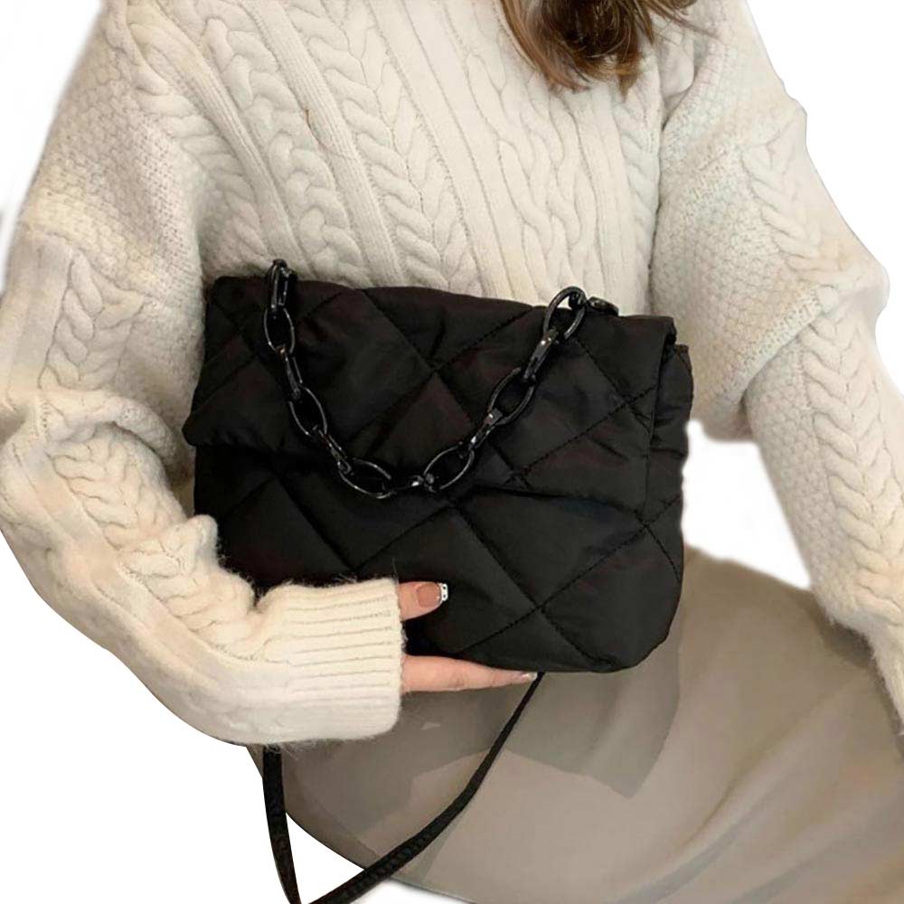 Black Quilted Padded Flap Shoulder Bag Crossbody Bag, this bag is expertly crafted for both style and functionality. With its padded design and quilted detailing, this bag offers both a stylish and comfortable way to carry your essentials. The flap closure adds an extra layer of security, perfect for daily or occasional use.