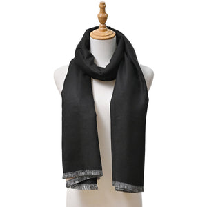 Black Reversible Frayed Oblong Scarf, Wrap yourself in style and warmth with this beautiful scarf. Crafted with sumptuous, lightweight fabric, this versatile scarf can be worn in two ways. A perfect winter accessory for wardrobe staples makes it perfect for gifting as a winter gift to any close person or treating yourself.