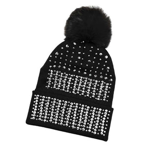 Black Silver Bling Pom Pom Beanie Hat, Look stylish this winter in this beanie ha. Features a beautifully sequined pattern and a luxurious faux fur pom-pom, designed to make a statement. It's perfect for any outdoor activity, keeping your head warm and fashionable. Perfect winter gift idea for fashion-loving ones.