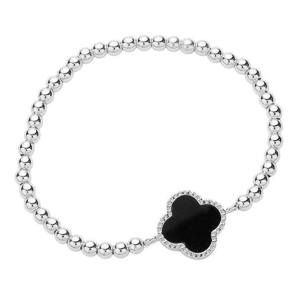 Black Silver Quatrefoil Pointed Stainless Steel Ball Beaded Stretch Bracelet is a sleek and modern accessory that adds flair to any outfit. This stretch bracelet is durable and stylish, made with high-quality stainless steel and featuring a trendy quatrefoil pointed design. It is perfect for any fashion-forward individual looking to elevate their style game.