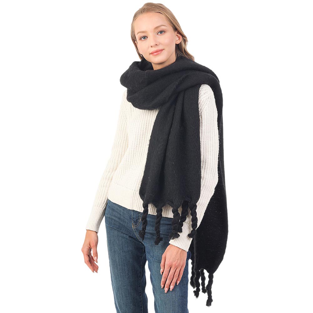 Black Solid Braided Tassel Oblong Scarf, is perfect for adding a touch of sophistication to any winter ensemble. It's made of smooth fabric and features a braided pattern that adds a textured look. This scarf provides a comfortable fit all day long. Perfect for gifting to family members, loved ones, friends, or yourself.