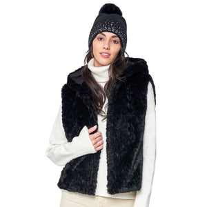 Black Solid Faux Fur Hooded Vest, is designed to keep you warm and stylish in the coldest of climates. Crafted from premium faux fur, this vest is sure to be a comfortable and stylish companion in any outfit. With a hood for additional protection and wind coverage, this vest is ideal for outdoor winter activities. 