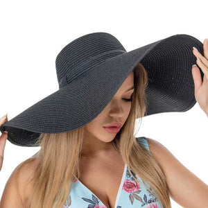 Black Solid Floppy Straw Sun Hat, Stay stylish and protected from the sun with our sun hats! Made from high-quality straw, this hat is perfect for any sunny day. Its floppy design not only looks fashionable but also provides ample shade for your face and neck. Don't forget to pack this accessory for your next beach trip!