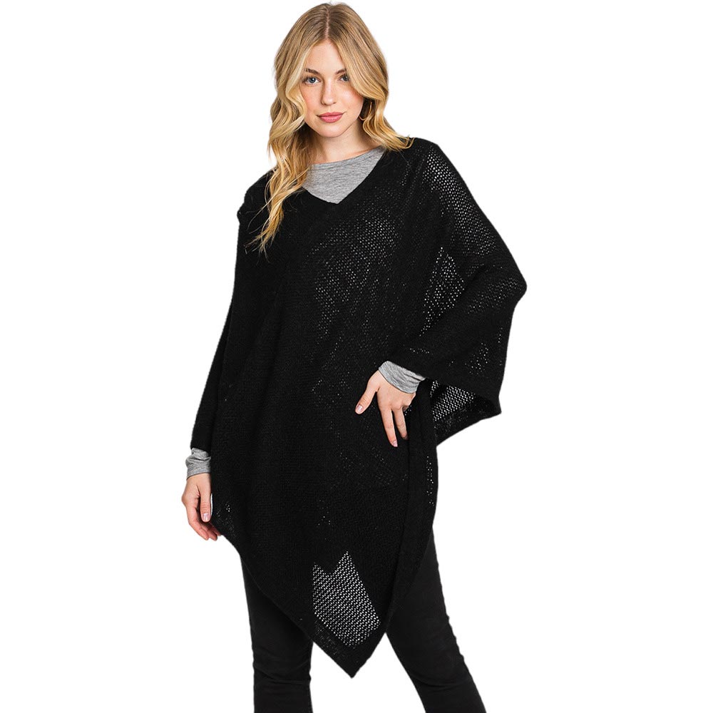 Black Solid Knit Loose Fit Poncho, Crafted from a comforting, arctic wool blend fabric, features a loose-fitting design that will keep you cozy without compromising on style. Perfect for day-to-day wear. Look stylish and stay warm in this stylish poncho. It can be a stylish gift to family members or fashion loving friends.