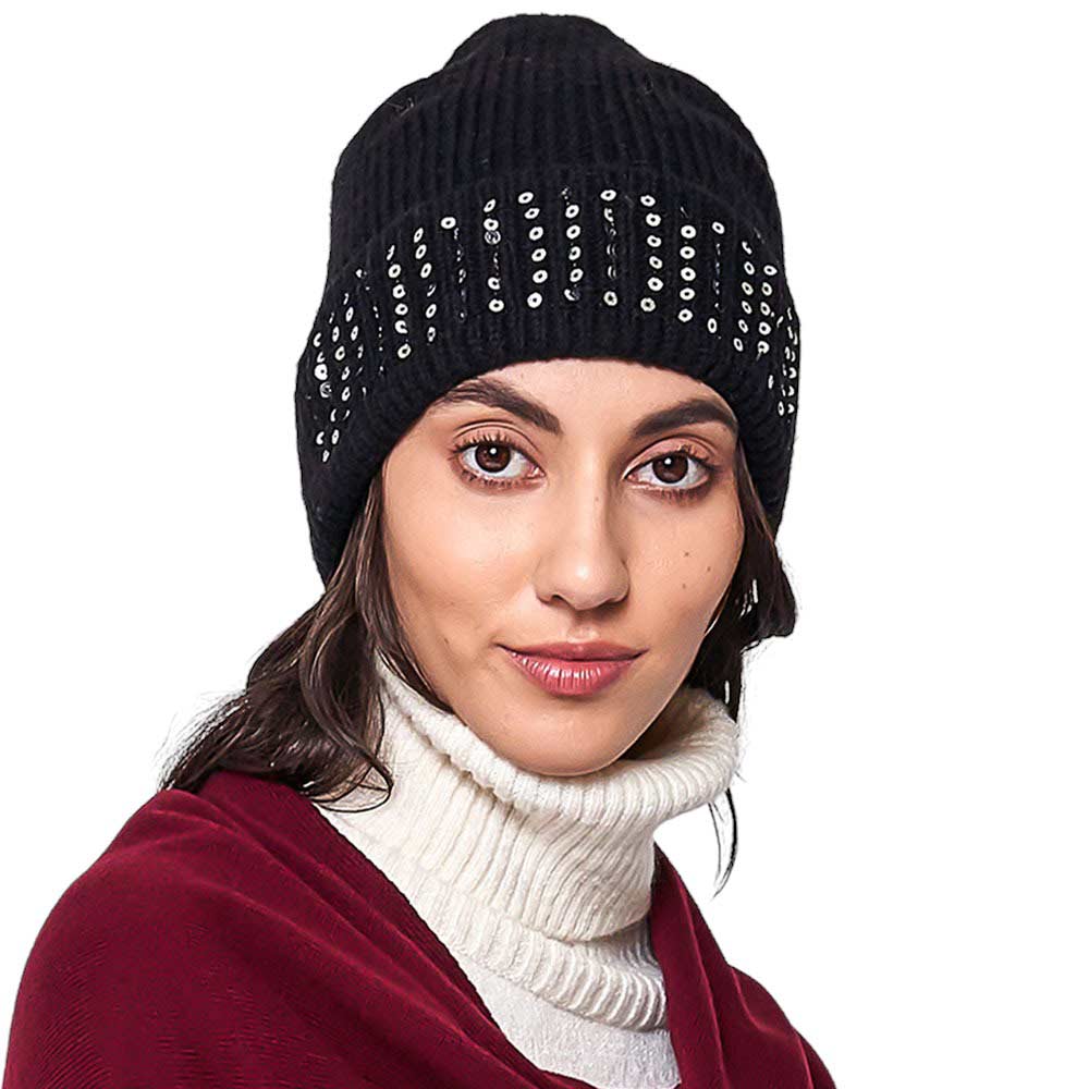 Black Solid Ribbed Sequin Cuff Beanie Hat, is perfect for staying warm and stylish in cold weather. Its ribbed knit construction and sequin cuff add structure and texture, while providing warmth and comfort. It is lightweight and easy to pack, making it an ideal accessory for any cold-weather excursion or an exquisite gift.