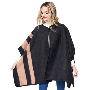 BlackStriped Button Closure Cape Ruana Poncho, effortlessly combines style and function. Crafted with pure polyester, this poncho is designed with a bold striped pattern and a button closure, making it the perfect piece to transition from day to night. Versatile and stylish, this poncho will become a go-to in your wardrobe.