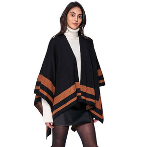 Black Striped Shoulder Strap Ruana Poncho, boasts a striking look and a unique blend of materials that make it both stylish and comfortable. Sophisticated stripes are complemented by a luxurious velvety texture, offering an eye-catching look that makes a statement wherever you go. Excellent gift choice for the winter.