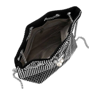 Black Studded Drawstring Chain Bucket Bag, is the perfect way to carry your belongings in style. Composed of durable material, it features studded detailing and a drawstring closure ensuring your items are securely stored. Its chic design and spacious interior make it a great gift item and a must-have for any fashionista.