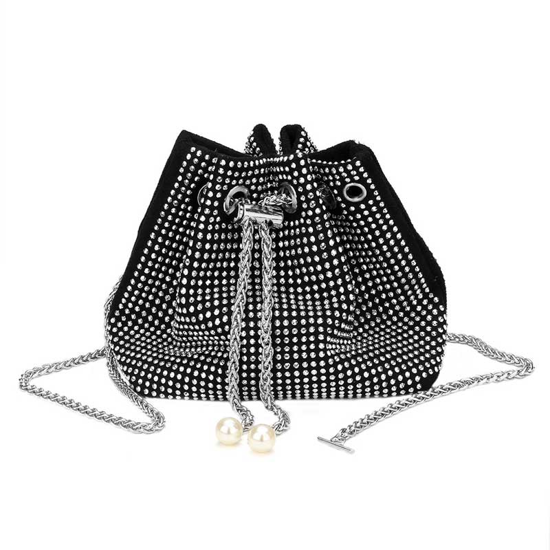 Black Studded Drawstring Chain Bucket Bag, is the perfect way to carry your belongings in style. Composed of durable material, it features studded detailing and a drawstring closure ensuring your items are securely stored. Its chic design and spacious interior make it a great gift item and a must-have for any fashionista. 
