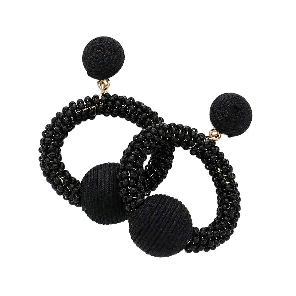 Black Thread Wrapped Ball Accented Seed Beaded Open Circle Dangle Earrings, Get in the loop with these playful earrings! The unique thread wrapped design and dangling open circles make for a quirky, fun addition to any outfit. Don't miss out on this trendy accessory (pun intended)!
