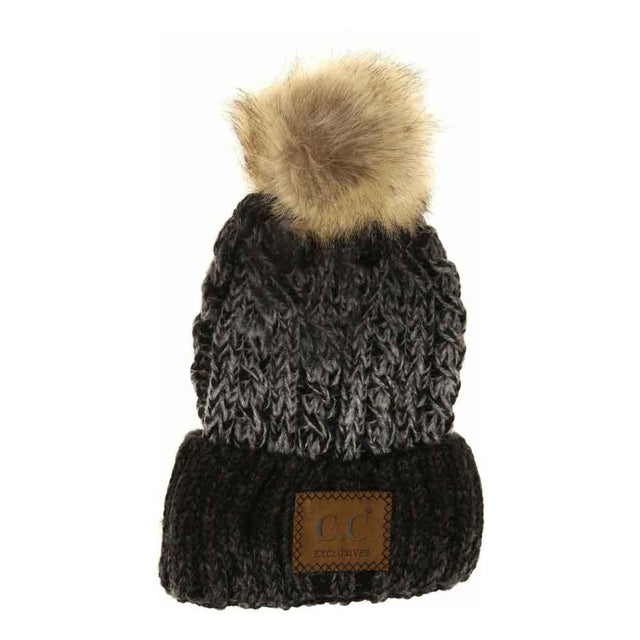 Black The Two-Tone Ombre Vintage Faux Fur Pom Beanie blends classic style with contemporary design through its subtle ombre shading and plush faux fur pom. Crafted for warmth and comfort, this beanie offers superior insulation, making it an essential accessory for colder seasons. Its vintage-inspired look adds refined character while ensuring durability and softness for everyday wear. Ideal for those who value both elegance and practical cold-weather protection. 