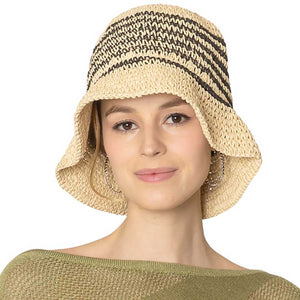 Black Two-Tone Stripe Straw Bucket Hat, Stay cool and stylish with the stylish summer hat. This quirky hat features a unique two-tone stripe design that adds a touch of fun to any outfit. Keep the sun out of your eyes while adding a playful flair to your look. Perfect for a day at the beach or a casual outing.