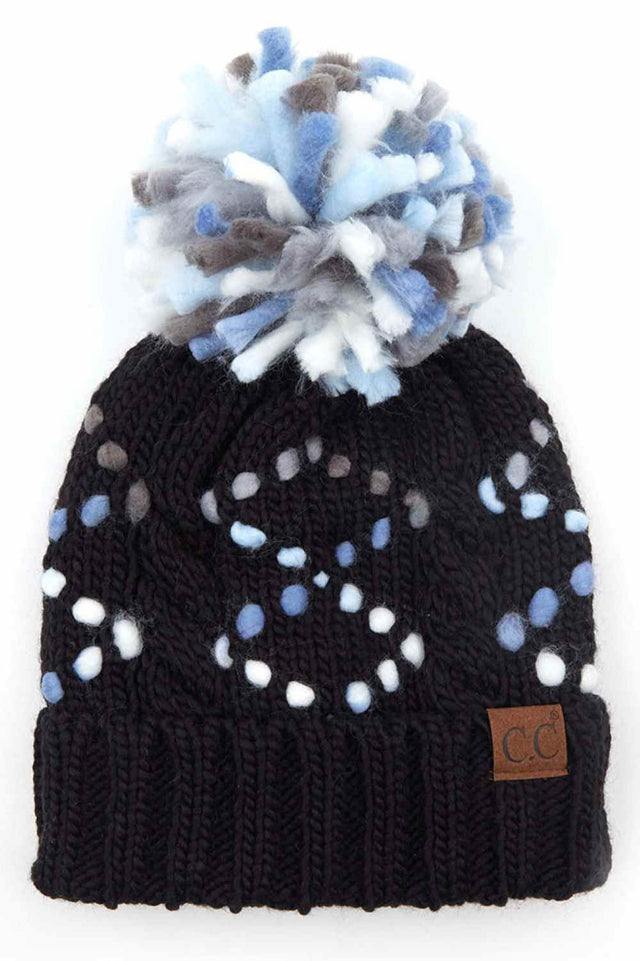 Black The C.C Chunky Jumbo Yarn Lining Beanie with Pom Hat showcases an oversized chunky knit made from thick jumbo yarn for a bold, cozy winter look. Featuring a soft inner lining and a fluffy pom accent, it provides extra warmth and a comfortable, snug fit for cold-weather days.