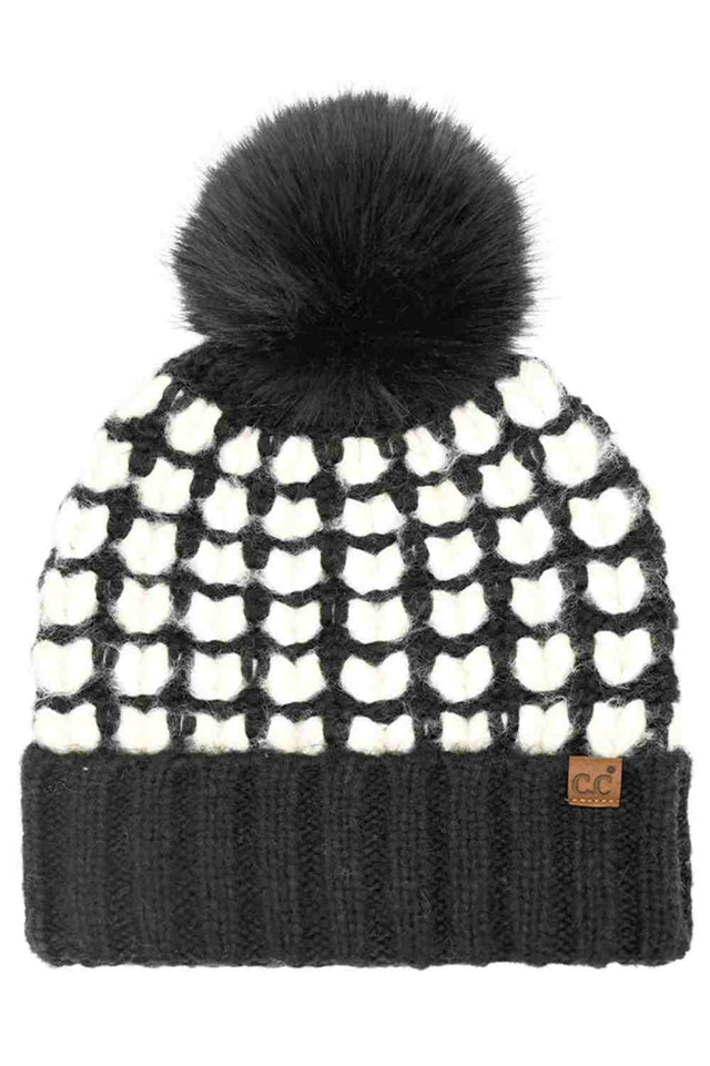 Black C.C Full of Heart Pattern Pom Beanie Winter Hat features an adorable heart-knit design topped with a fluffy pom for a cozy, love-filled winter look. Finished with a soft cuff and stretch fit, it delivers warm comfort while adding charming style to your cold-weather outfits.