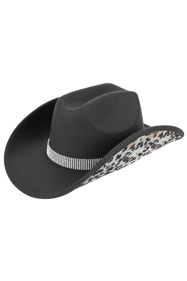 Black Make a statement with this C.C Leopard Pattern Rhinestone Cowboy Hat, where bold animal print meets sparkling embellishment. Constructed from 100% polyester vegan felt, this hat offers a soft, suede-like texture with lasting durability. The rhinestone accents add glamorous detail perfect for Western-inspired outfits, festivals, or standout everyday style. With a 3.5" brim and 5" crown, it's designed for a comfortable fit. One size fits most with a 22.63" circumference. Made in China.