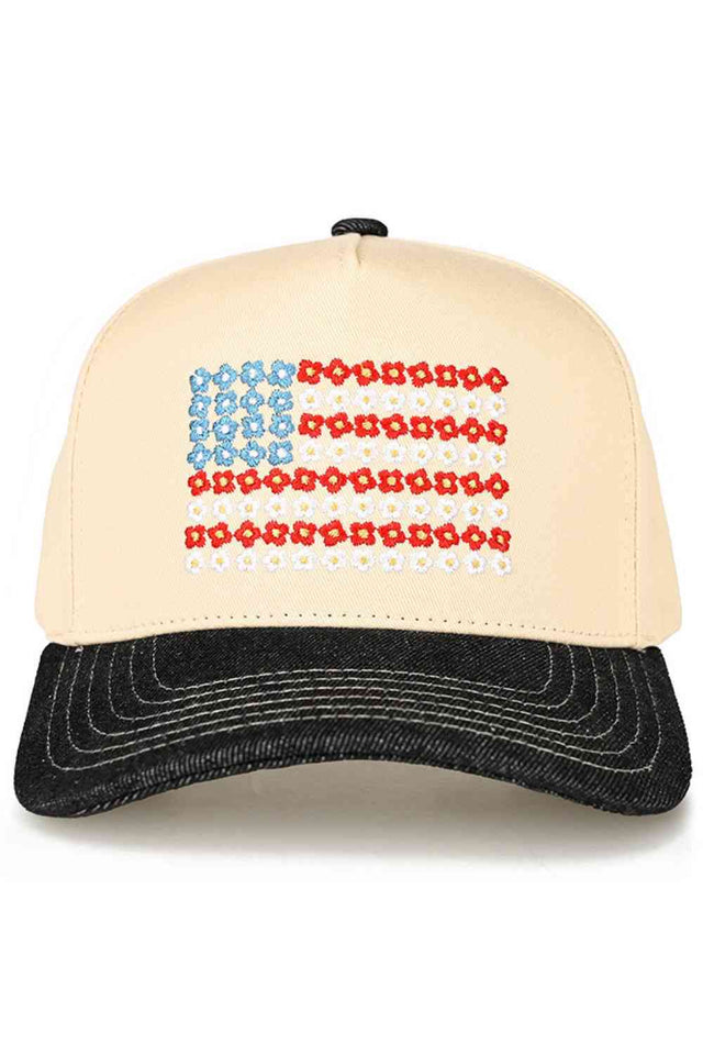 Black Denim C.C Daisy Flower Embroidered Pattern USA Flag Trucker Hat Baseball Cap features charming daisy embroidery paired with a patriotic USA flag design for a unique, eye-catching look. Designed in a classic trucker style, it offers lightweight comfort and an adjustable fit for everyday wear.