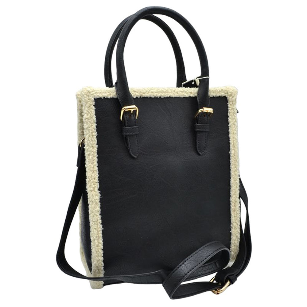 Black Faux Shearling Trim With Detachable Strap Crossbody Tote Bag. This stylish bag features an elegant faux shearling trim and a detachable strap for extra versatility. The faux shearling trim provides a pleasant and luxurious feel to the bag. It is perfect for carrying your daily essentials, from books to work essentials.